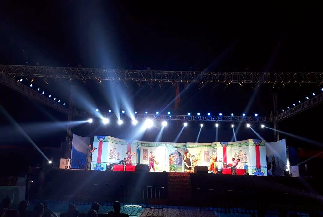 Night-time cultural dance performance on a truss-rigged stage with theatrical lighting, produced by SEM in Mumbai